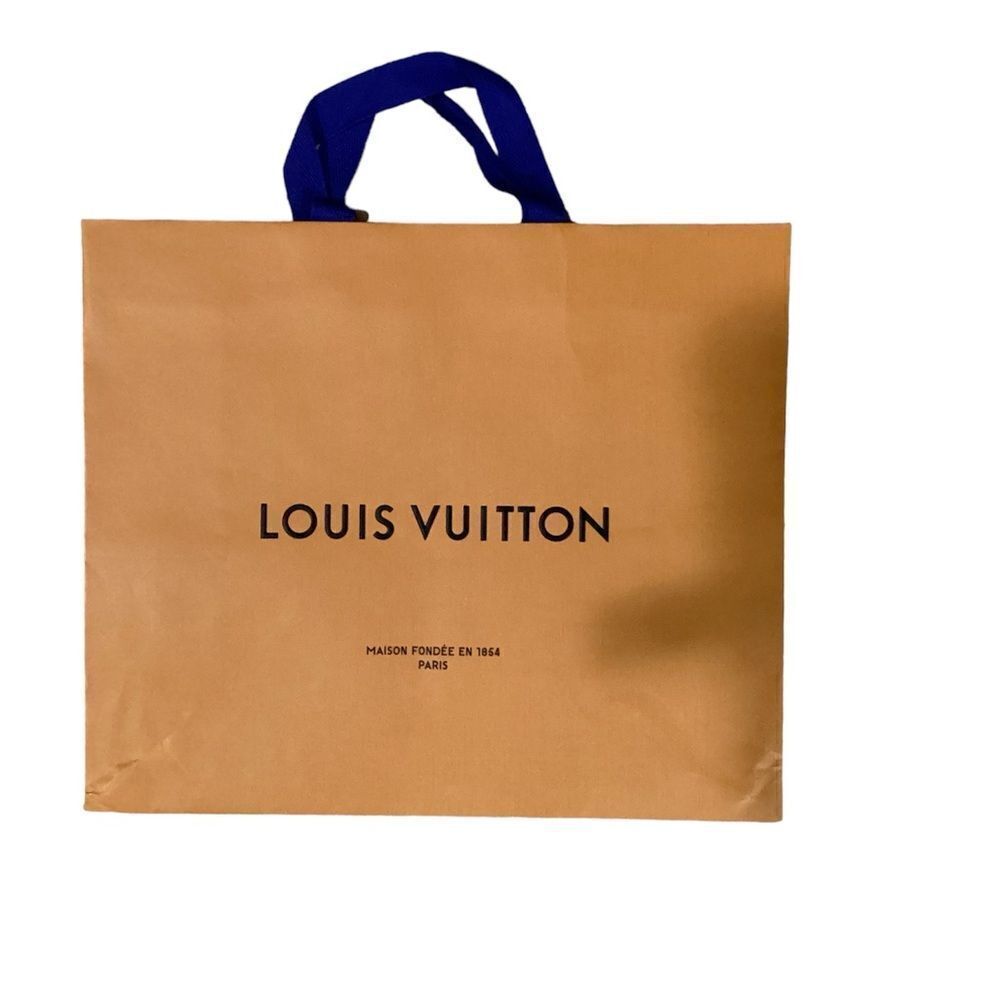 Louis Vuitton empty paper bag. 16” * 13”.